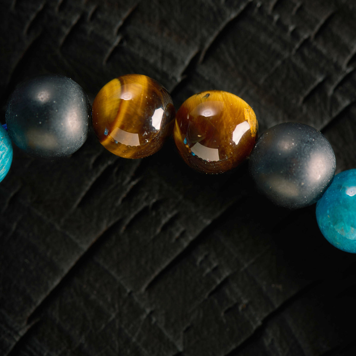 Bracelet élastique en Apatite, Oeil de Tigre et Agate Noire - Onyx